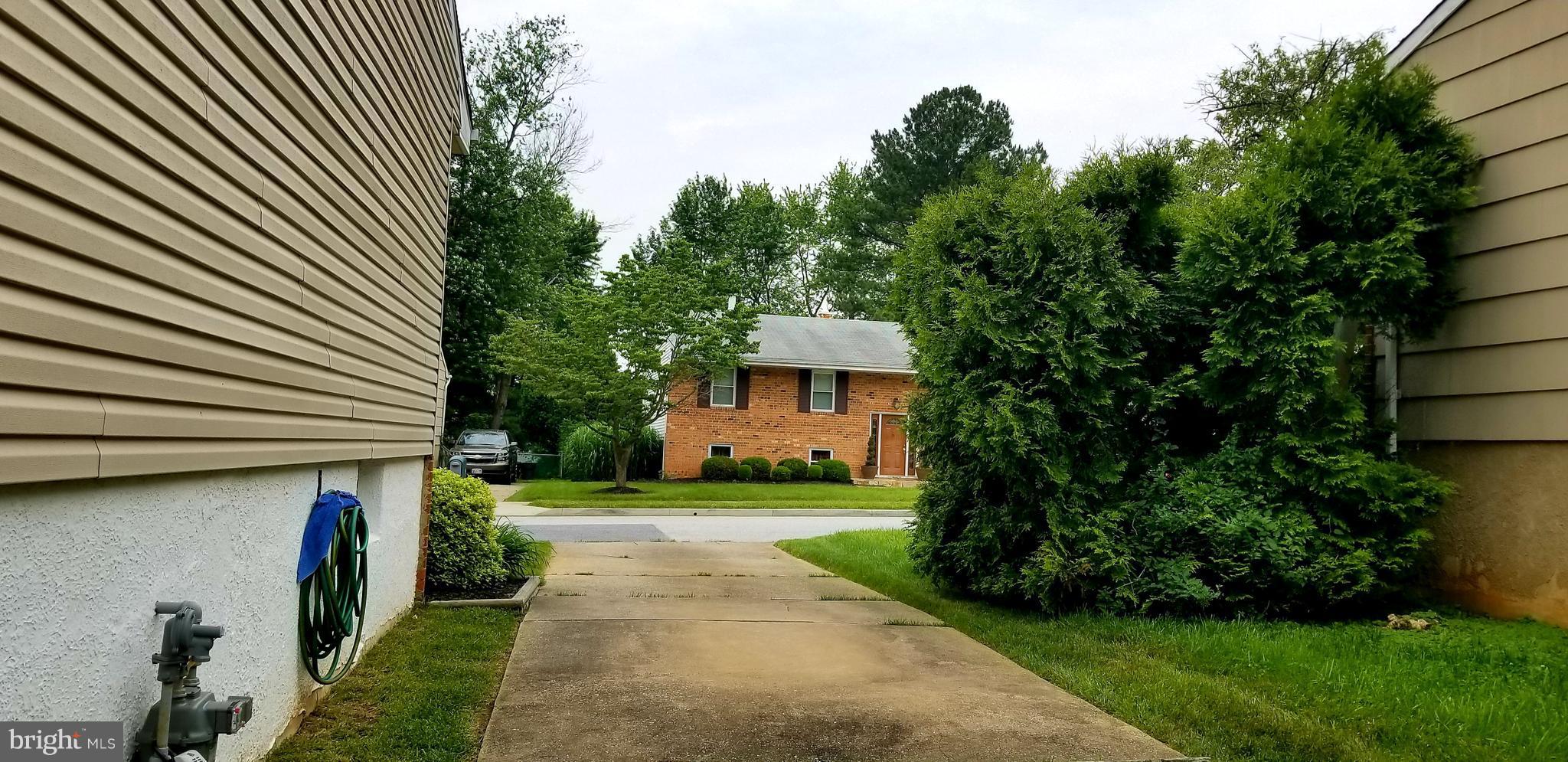 3907 Sybil Road Randallstown, MD 21133 - Photo 6 of 30 a view of a house with backyard and garden
