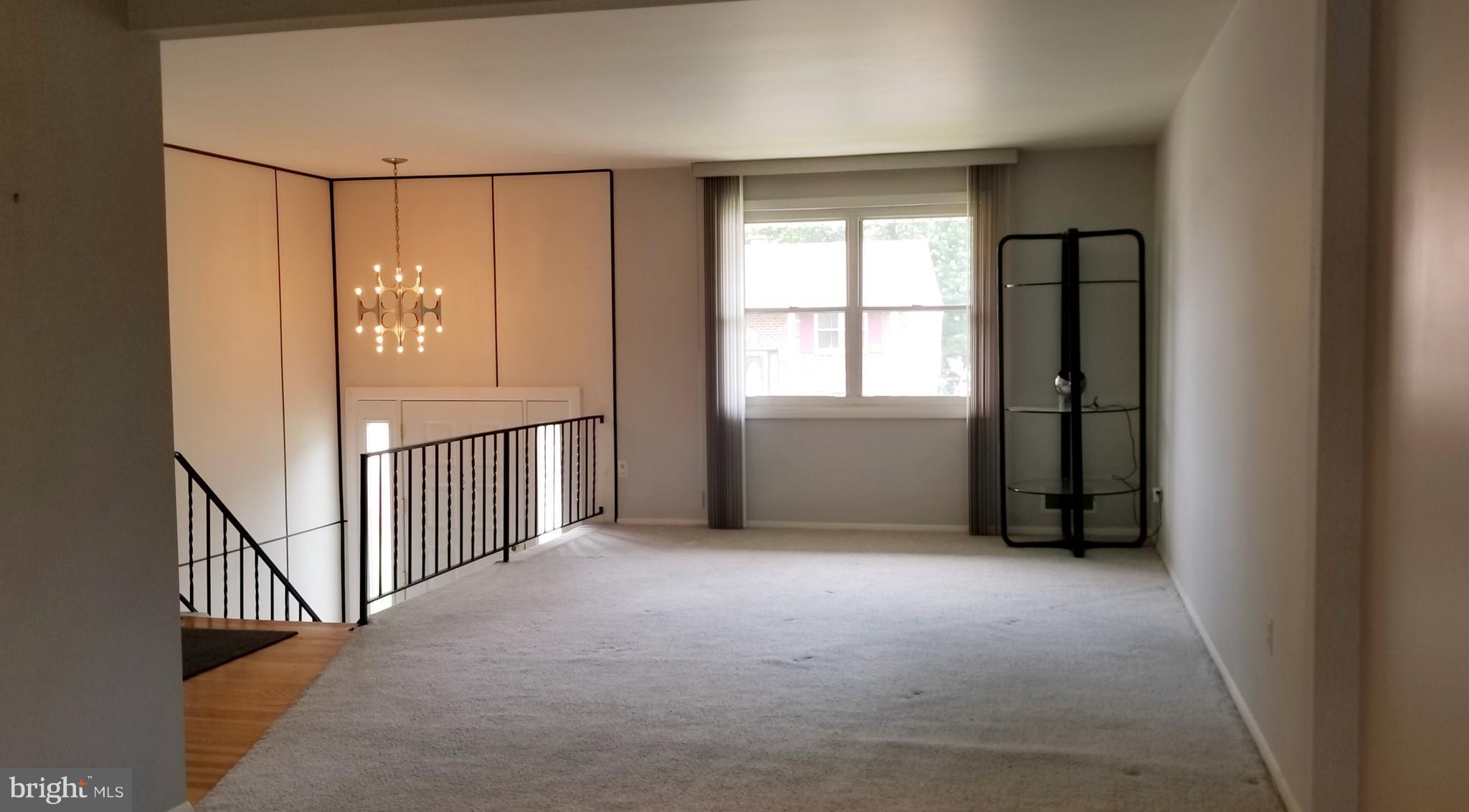 3907 Sybil Road Randallstown, MD 21133 - Photo 10 of 30 an empty room with windows