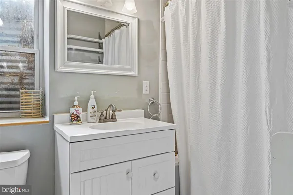 a bathroom with a sink and a vanity