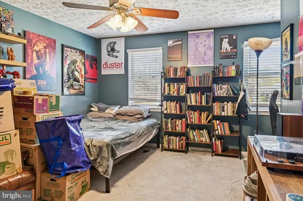 a bedroom with a bed and closet