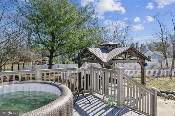a view of outdoor space with garden and trees