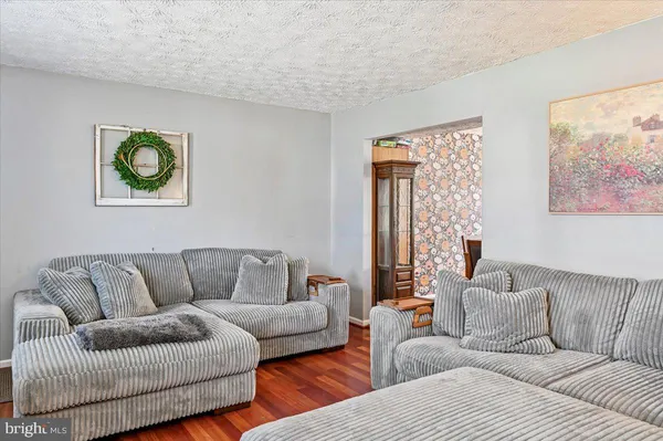 a living room with furniture and a couch