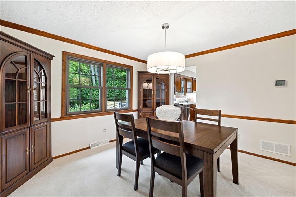 2972 East Hardies Road Gibsonia, PA 15044 - Photo 11 of 42 a view of a dining room with furniture window and outside view
