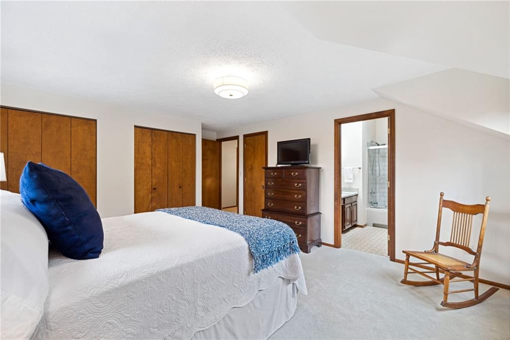 2972 East Hardies Road Gibsonia, PA 15044 - Photo 23 of 42 a bedroom with a bed and chair
