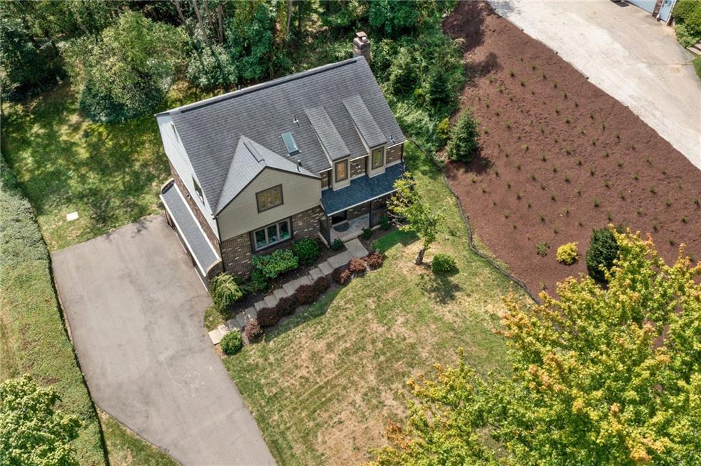 2972 East Hardies Road Gibsonia, PA 15044 - Photo 28 of 42 an aerial view of a house with a yard and large trees