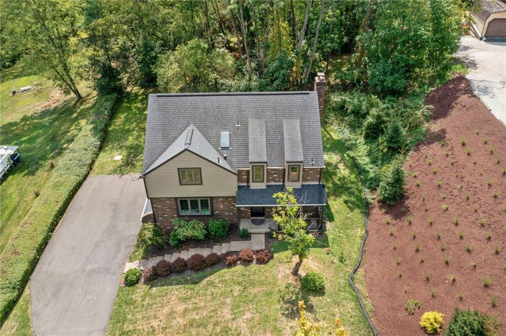 2972 East Hardies Road Gibsonia, PA 15044 - Photo 29 of 42 an aerial view of a house with a yard table and chairs