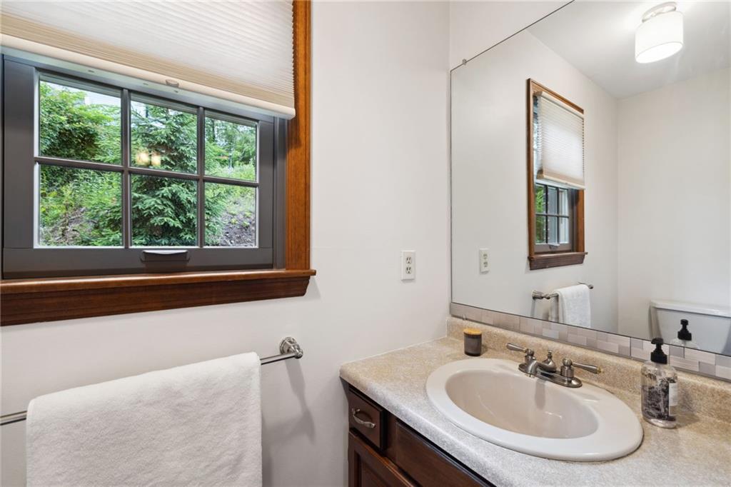 2972 East Hardies Road Gibsonia, PA 15044 - Photo 6 of 42 a bathroom with a sink and a window