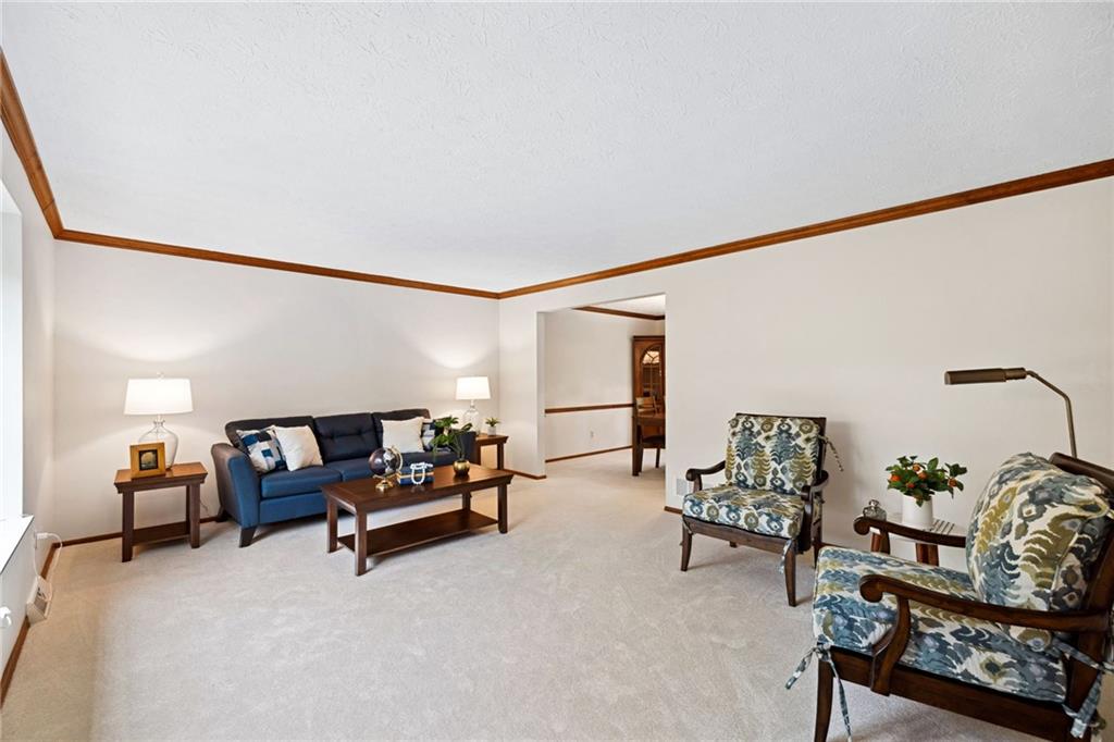 2972 East Hardies Road Gibsonia, PA 15044 - Photo 8 of 42 a living room with furniture and a couch