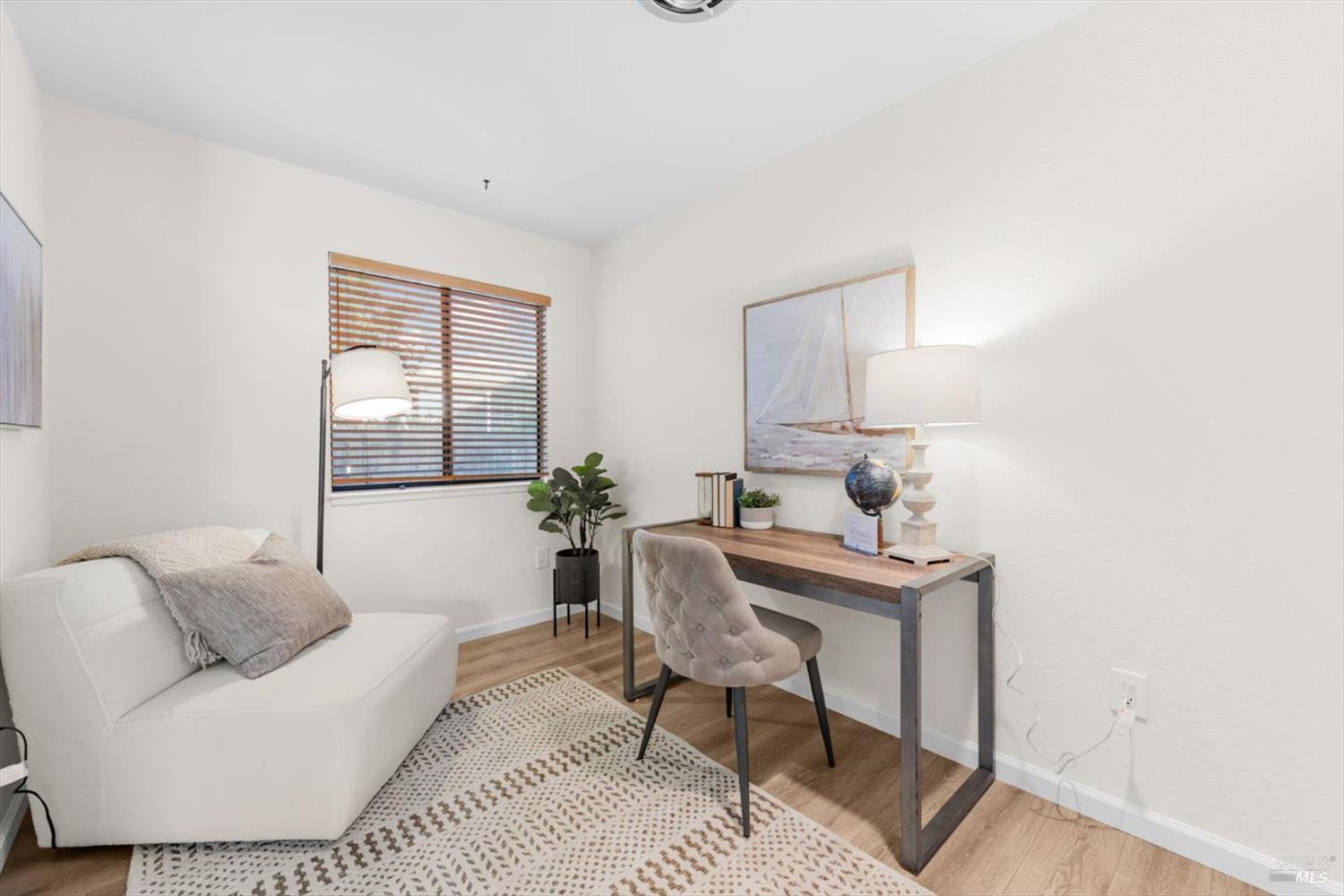 107 Inyo Court Vacaville, CA 95687 - Photo 22 of 49 a living room with furniture and a potted plant