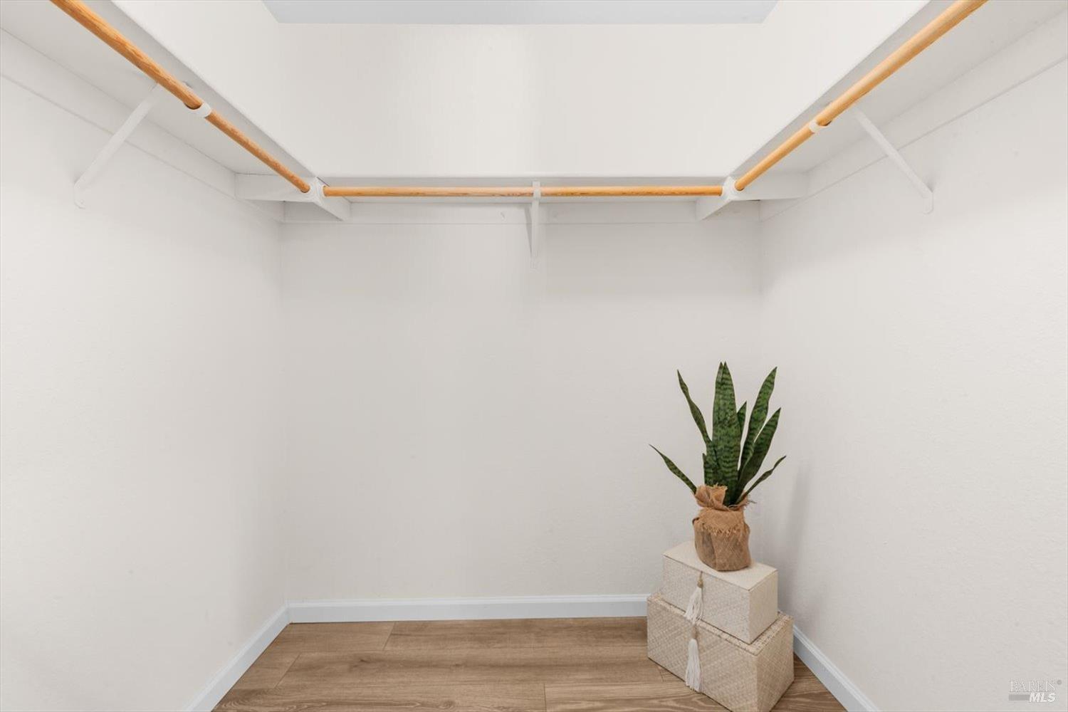 107 Inyo Court Vacaville, CA 95687 - Photo 25 of 49 a view of small space with wooden floor and potted plant