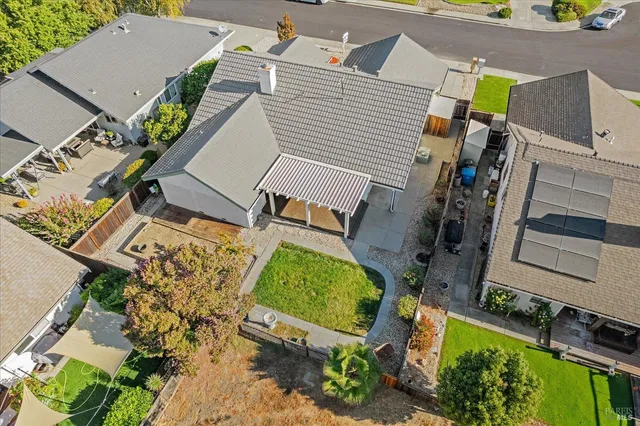 an aerial view of a house with a garden