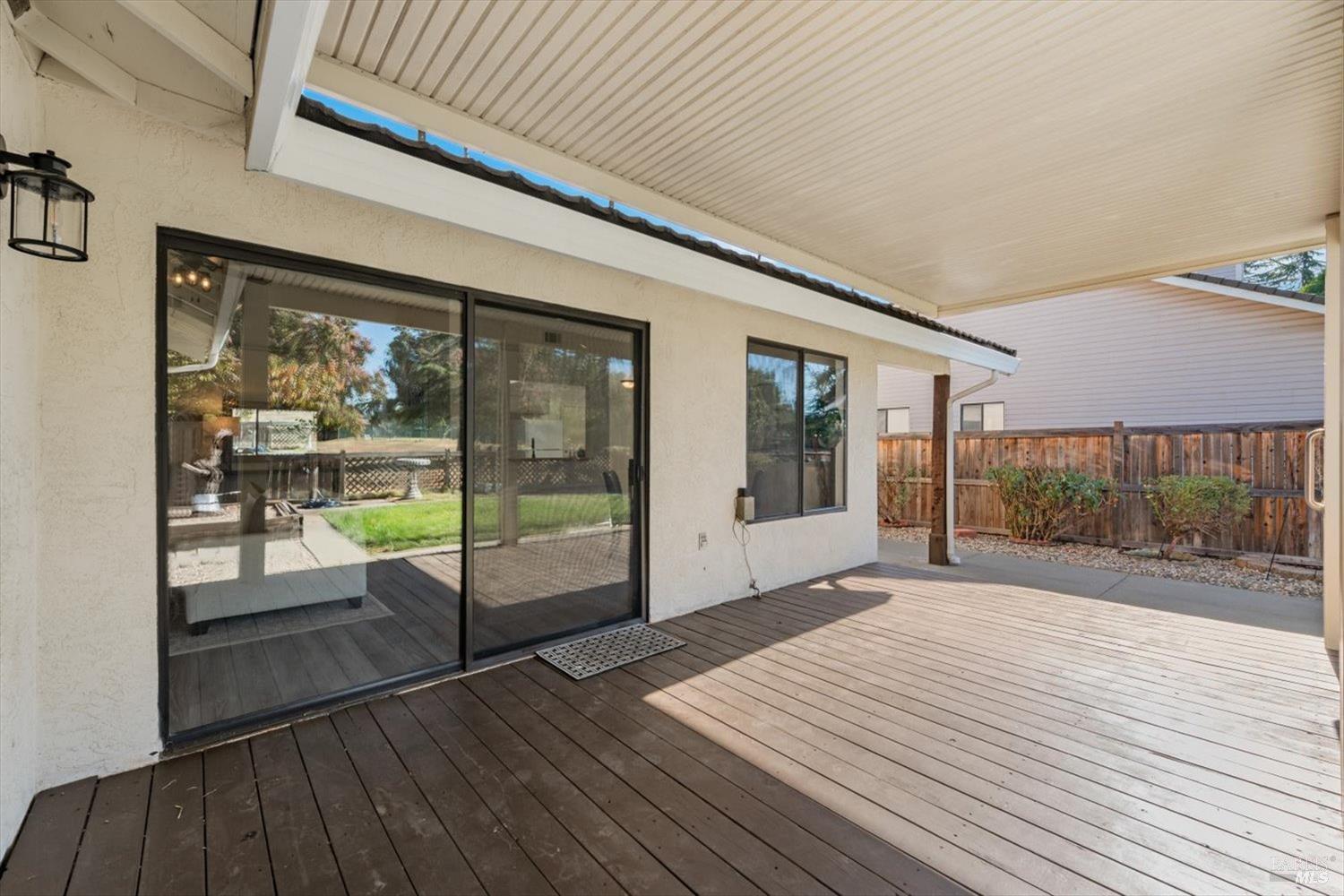 107 Inyo Court Vacaville, CA 95687 - Photo 35 of 49 a view of outdoor space with wooden floor and windows