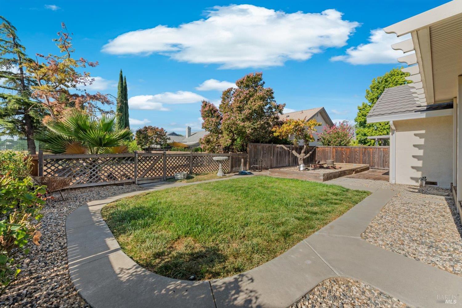 107 Inyo Court Vacaville, CA 95687 - Photo 39 of 49 a view of a garden with a houses