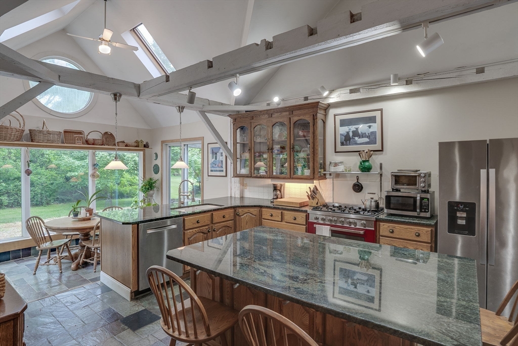 49 S Road Templeton, MA 01468 - Photo 6 of 33 a kitchen with stainless steel appliances granite countertop a sink and a refrigerator