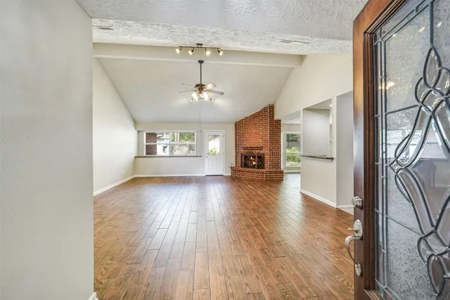 a view of an empty room and window