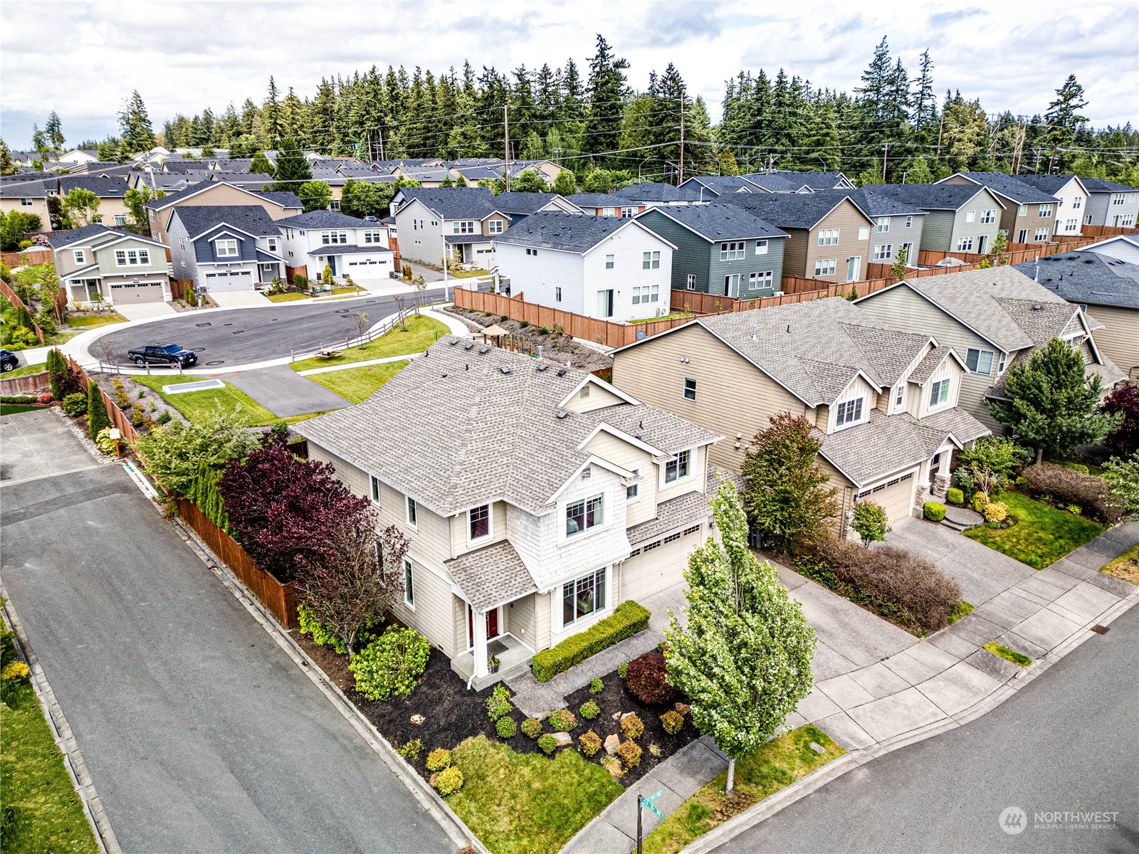 4315 229th Place Southeast Bothell, WA 98021 - Photo 1 of 40 an aerial view of a house with a garden