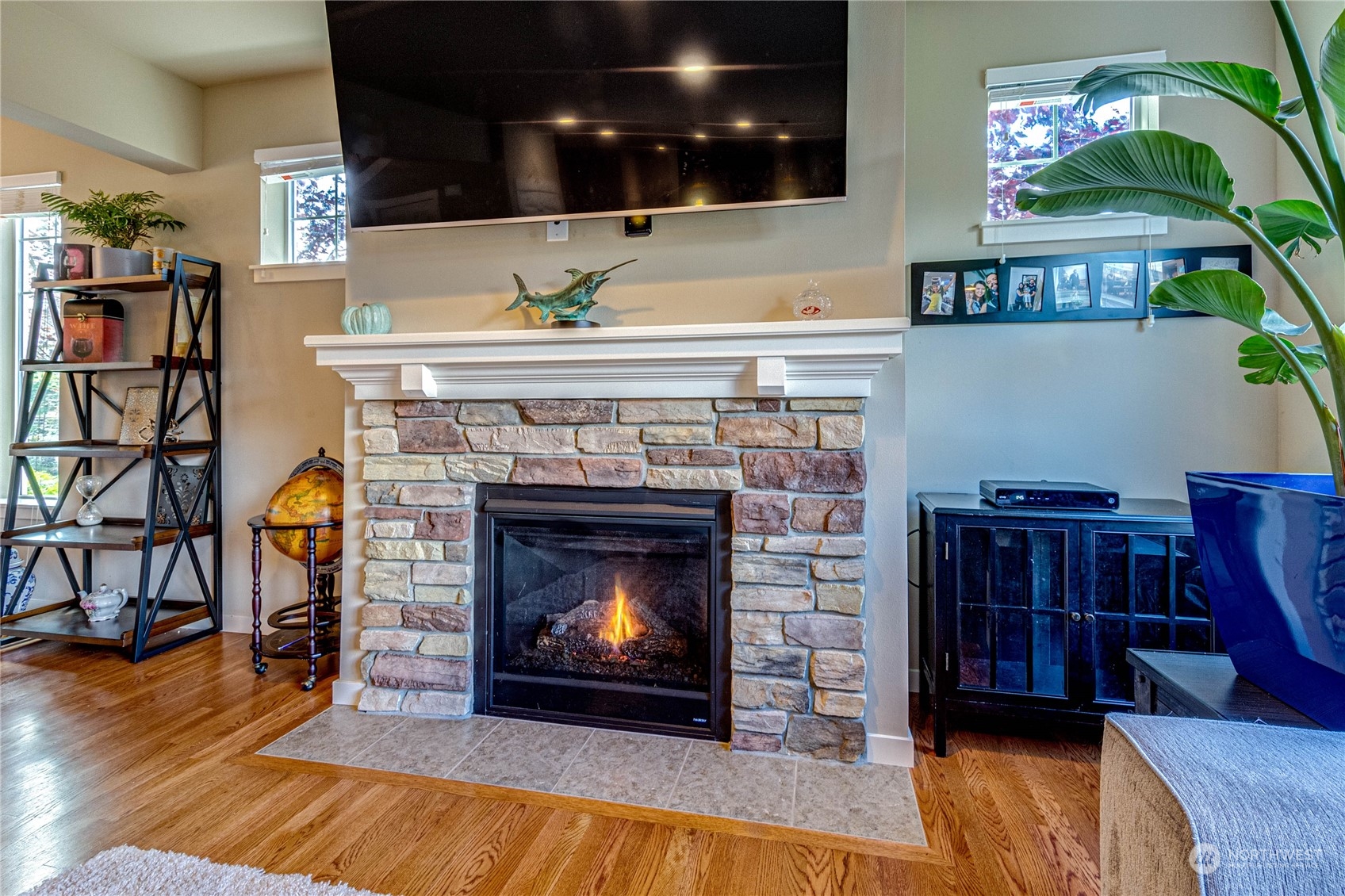4315 229th Place Southeast Bothell, WA 98021 - Photo 11 of 40 a living room with furniture and a fireplace