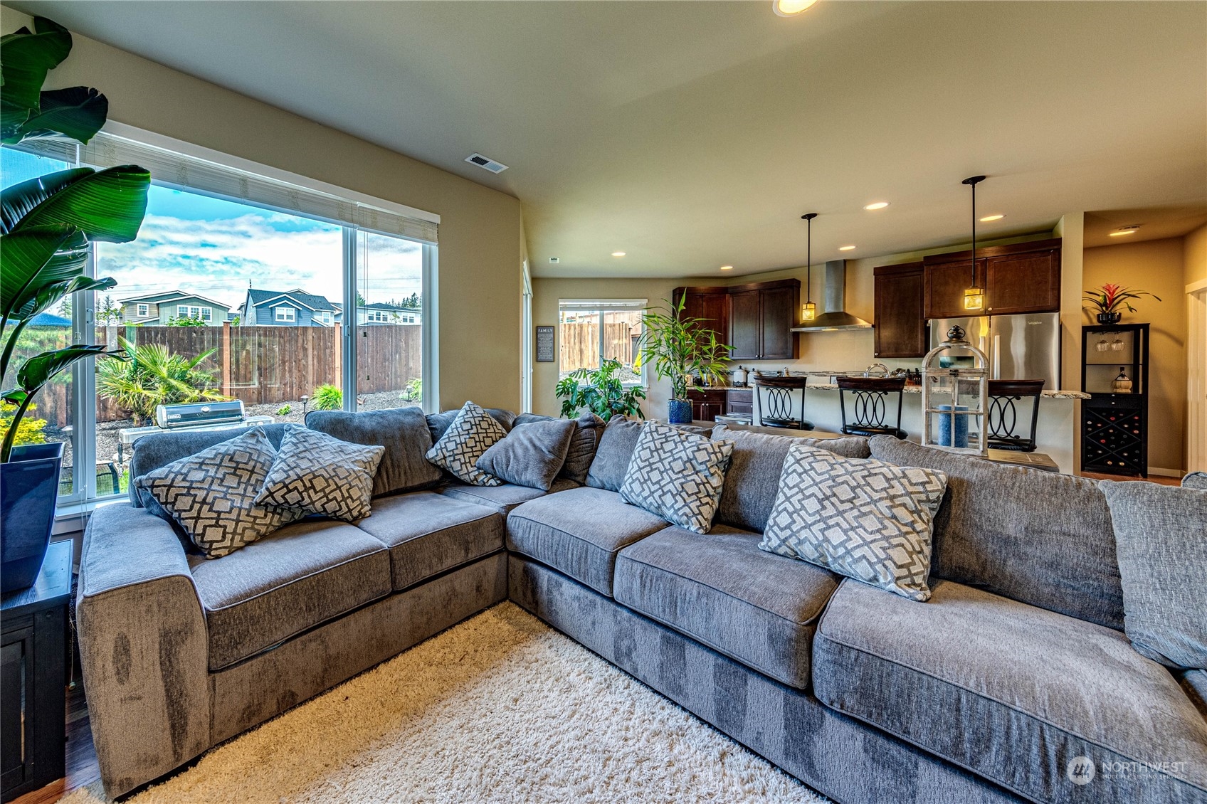 4315 229th Place Southeast Bothell, WA 98021 - Photo 12 of 40 a living room with furniture and a large window