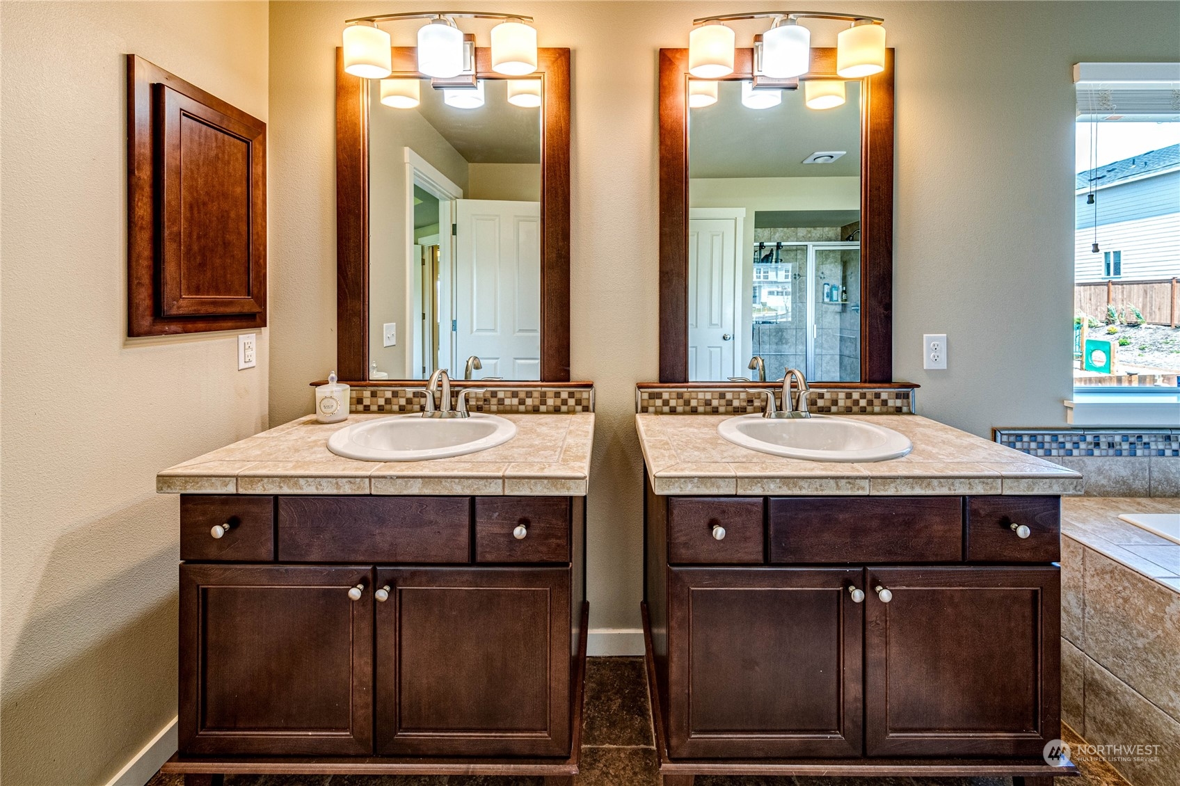 4315 229th Place Southeast Bothell, WA 98021 - Photo 26 of 40 a bathroom with a sink and a mirror