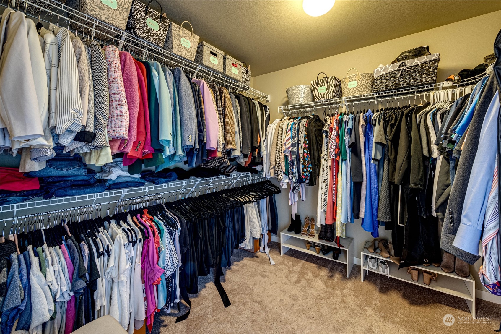 4315 229th Place Southeast Bothell, WA 98021 - Photo 29 of 40 a view of walk in closet with clothes