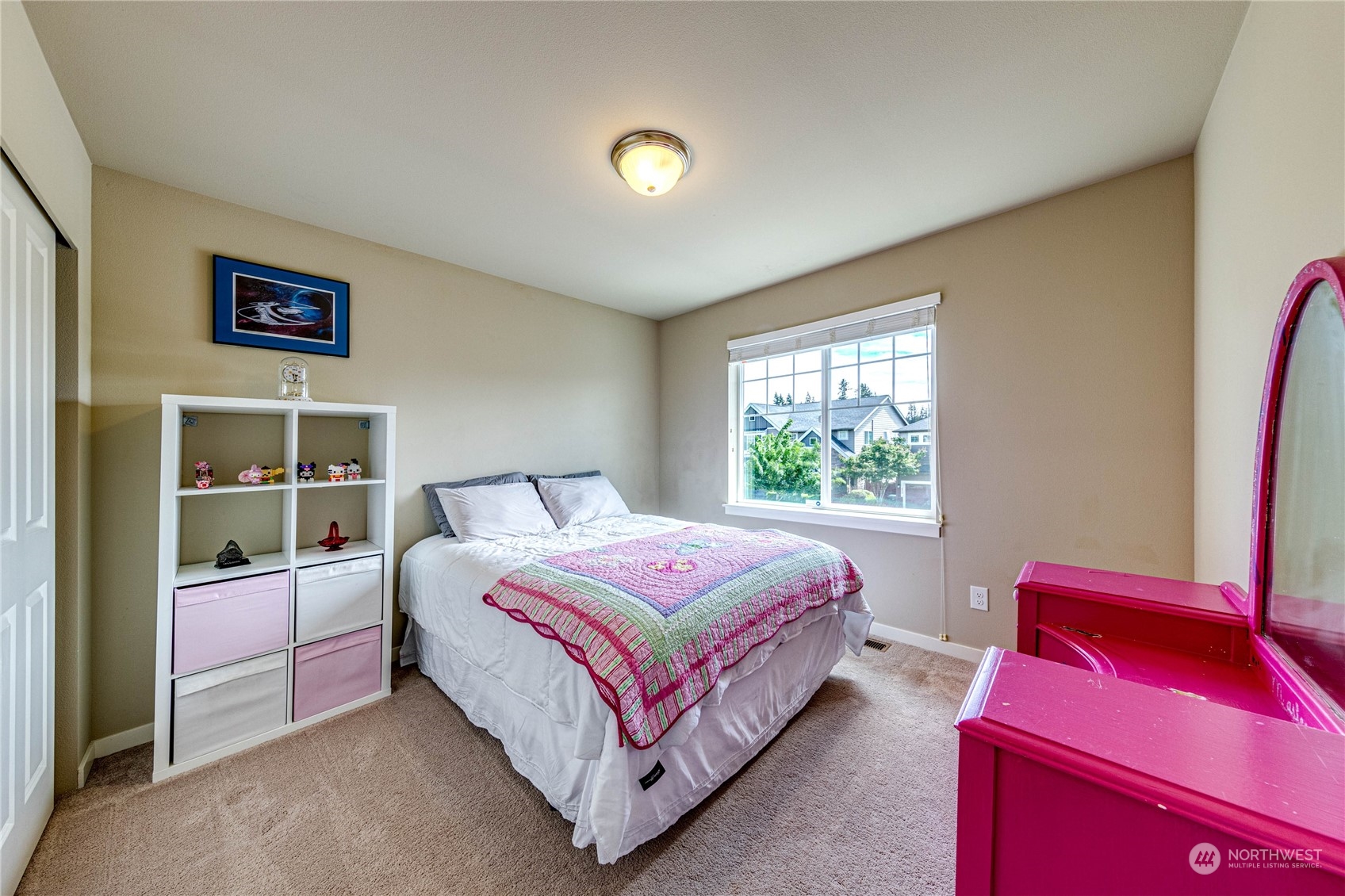 4315 229th Place Southeast Bothell, WA 98021 - Photo 33 of 40 a bedroom with a bed and a window