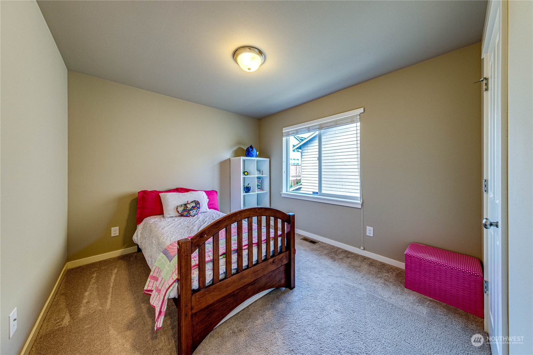 4315 229th Place Southeast Bothell, WA 98021 - Photo 34 of 40 a bedroom with a bed and window