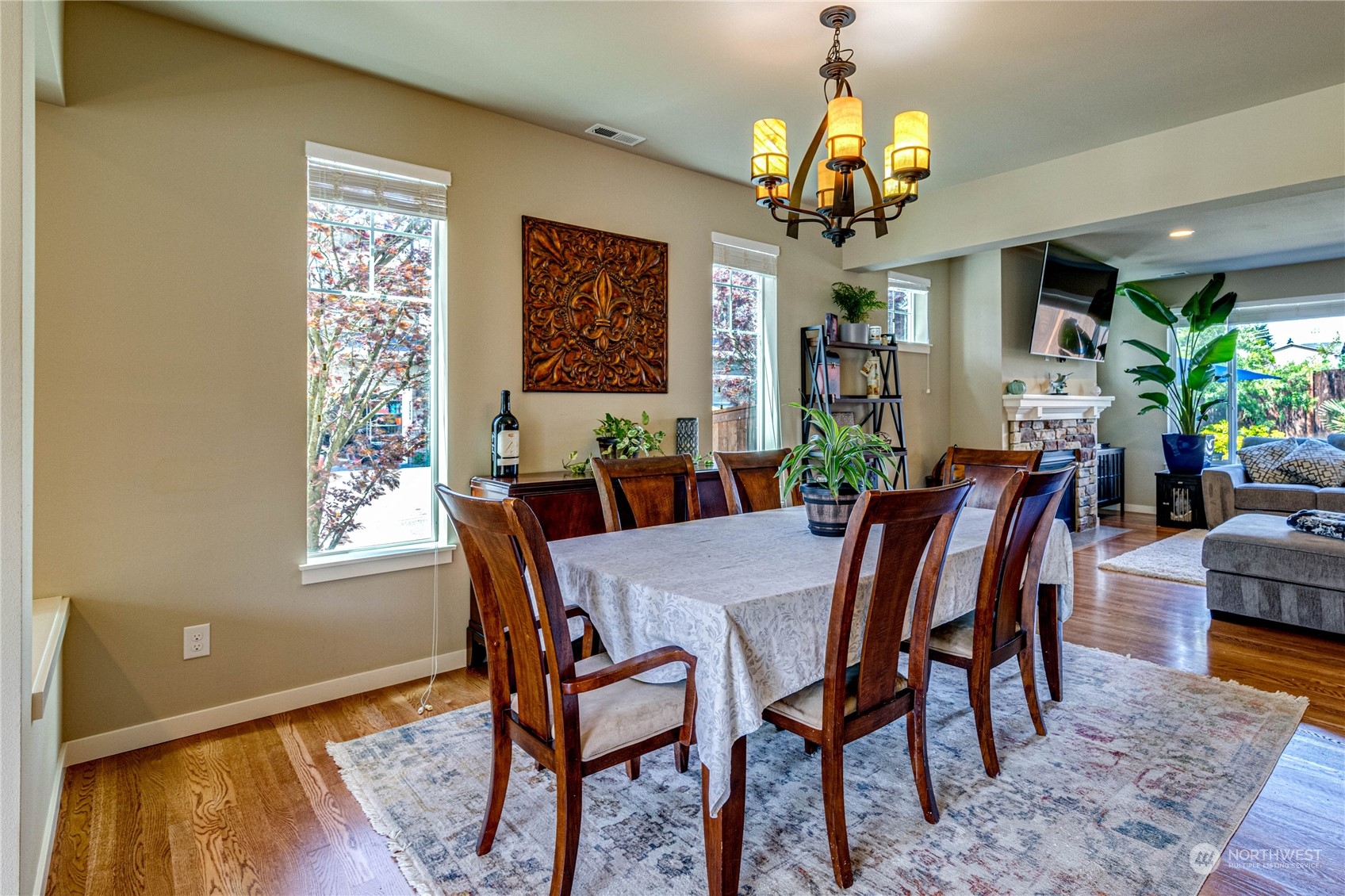 4315 229th Place Southeast Bothell, WA 98021 - Photo 8 of 40 a view of a dining room with furniture window and wooden floor