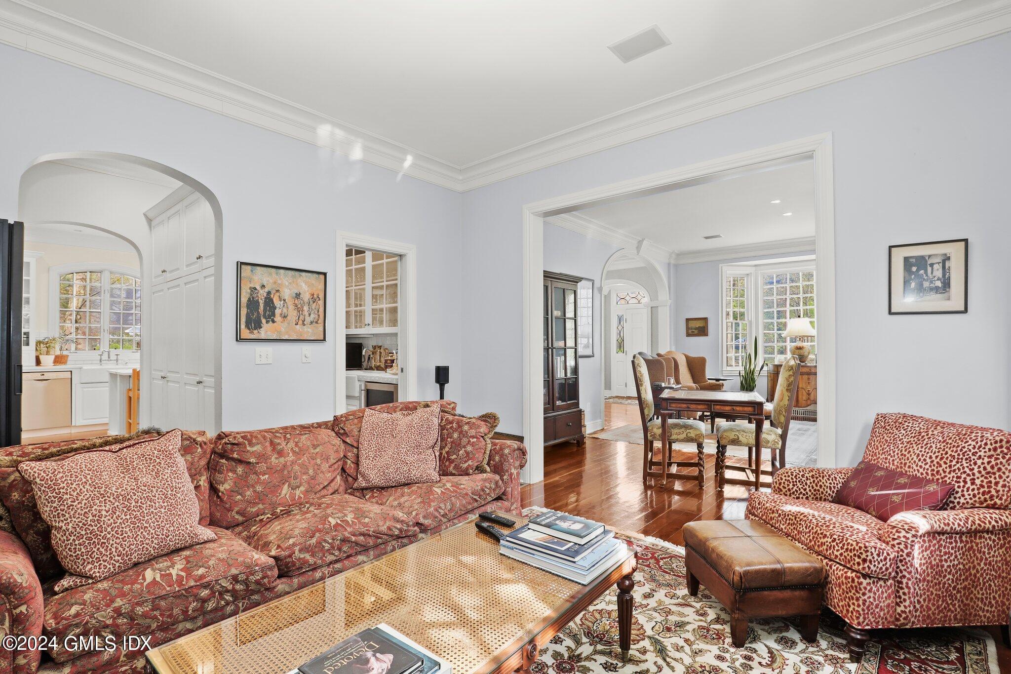 25 Field Road Riverside, CT 06878 - Photo 22 of 34 a living room with furniture or couch and a dining table