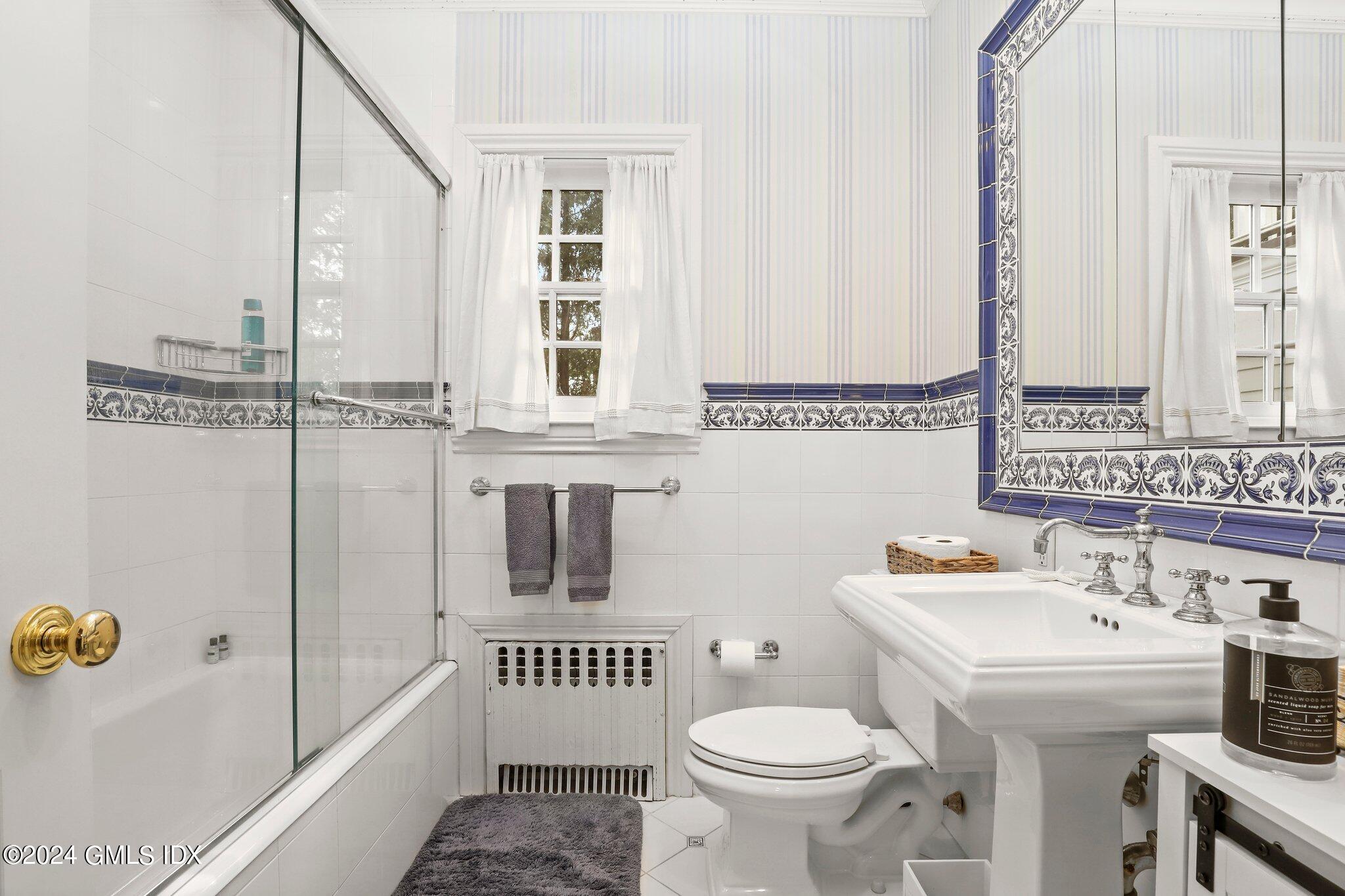 25 Field Road Riverside, CT 06878 - Photo 23 of 34 a bathroom with a sink toilet and shower