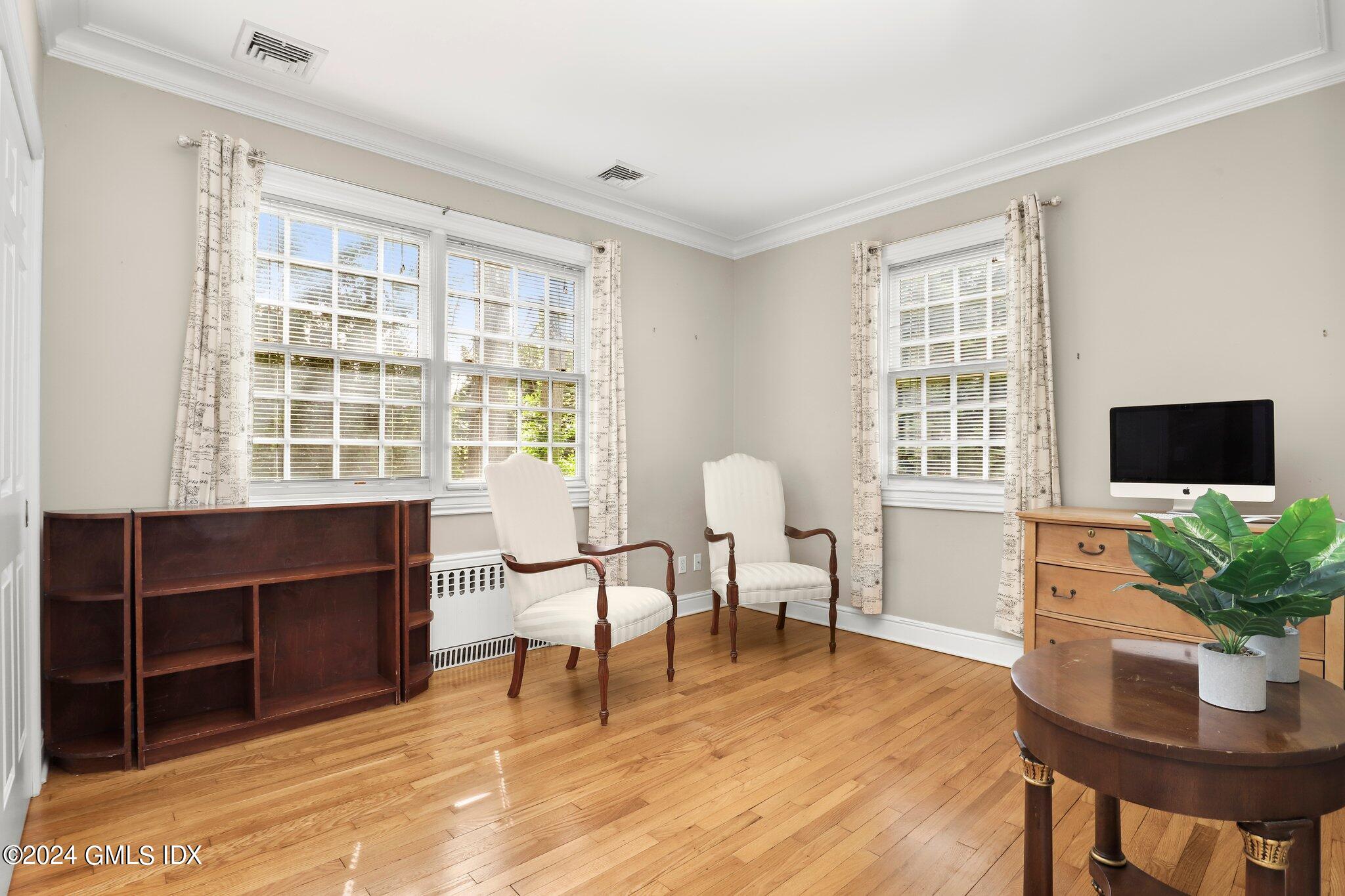 25 Field Road Riverside, CT 06878 - Photo 24 of 34 a view of a livingroom with furniture and a window