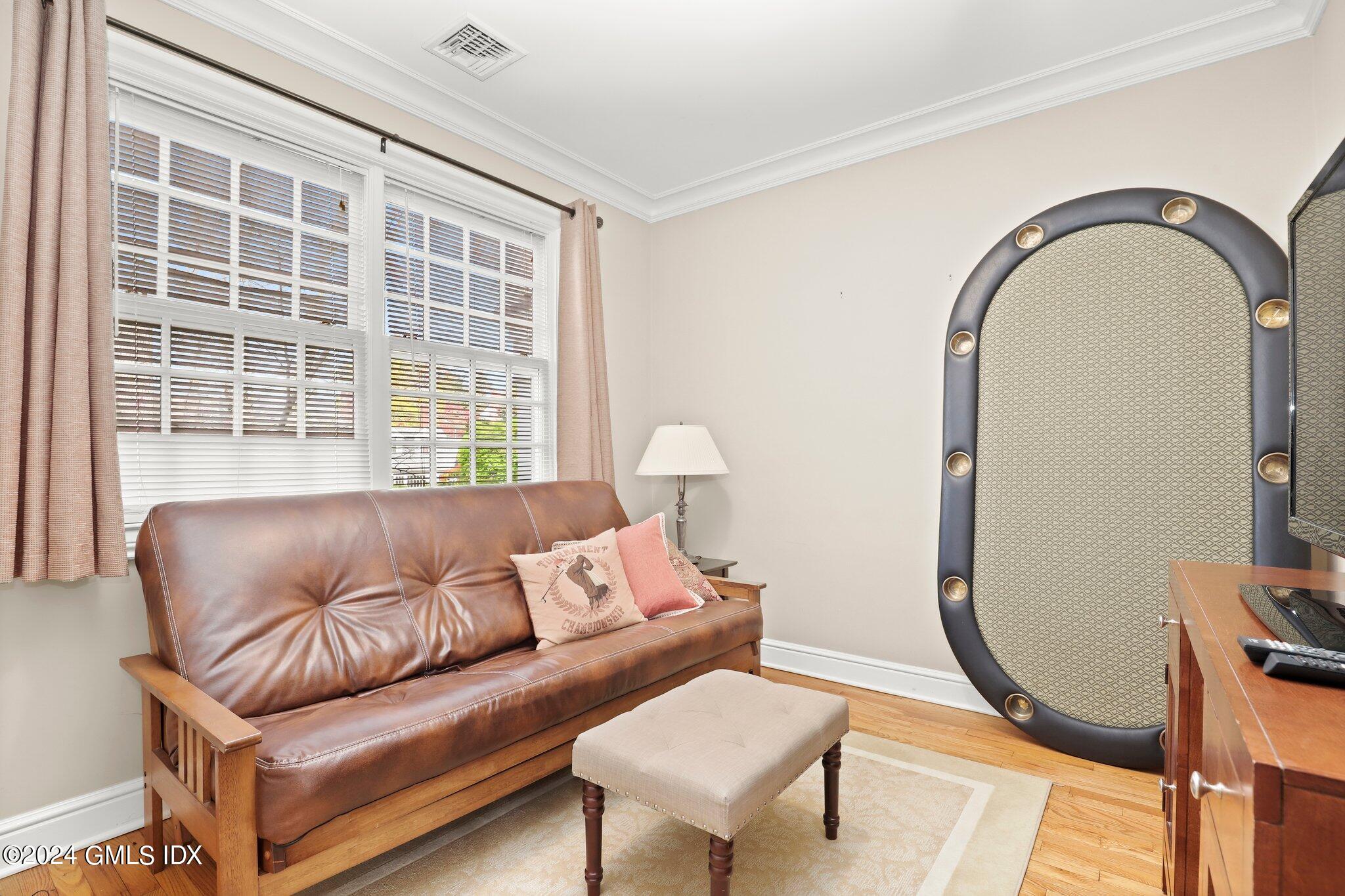 25 Field Road Riverside, CT 06878 - Photo 26 of 34 a living room with furniture and a window