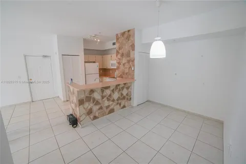 a view of a balcony with wooden fence and floor