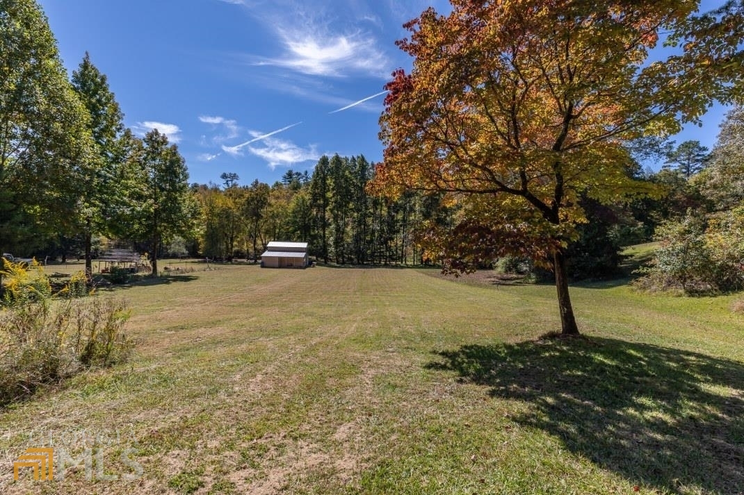 Lot 10 John's Ridge Road Blue Ridge, GA 30513 - Photo 1 of 1 a view of road with trees