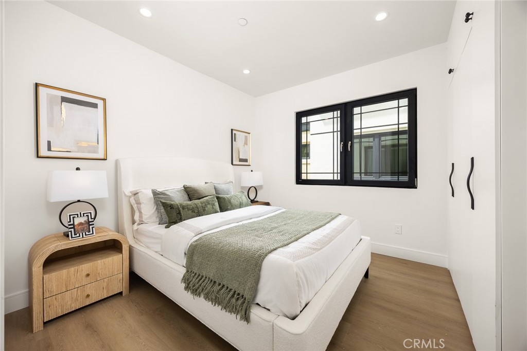 832 Sunset Boulevard, Unit B Arcadia, CA 91007 - Photo 20 of 47 a bedroom with a bed and a window