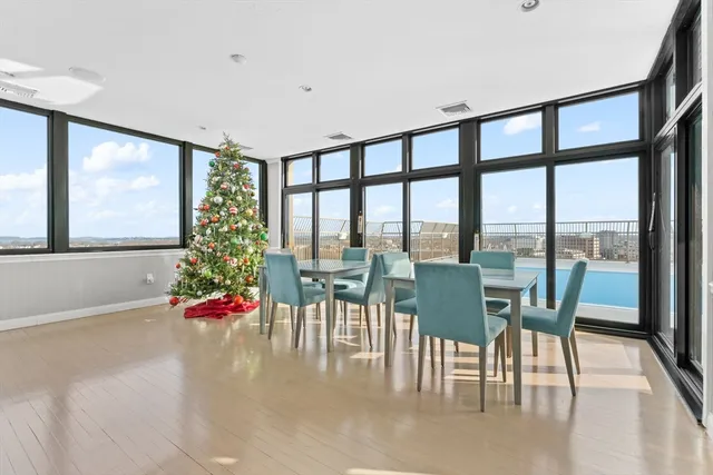a view of a dining room with furniture window and outside view
