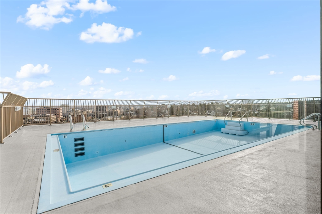 77 Adams Street, Unit 610 Quincy, MA 02169 - Photo 31 of 32 a view of kitchen and living room