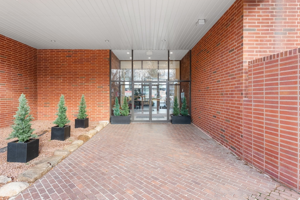 77 Adams Street, Unit 610 Quincy, MA 02169 - Photo 4 of 32 a view of a room with windows