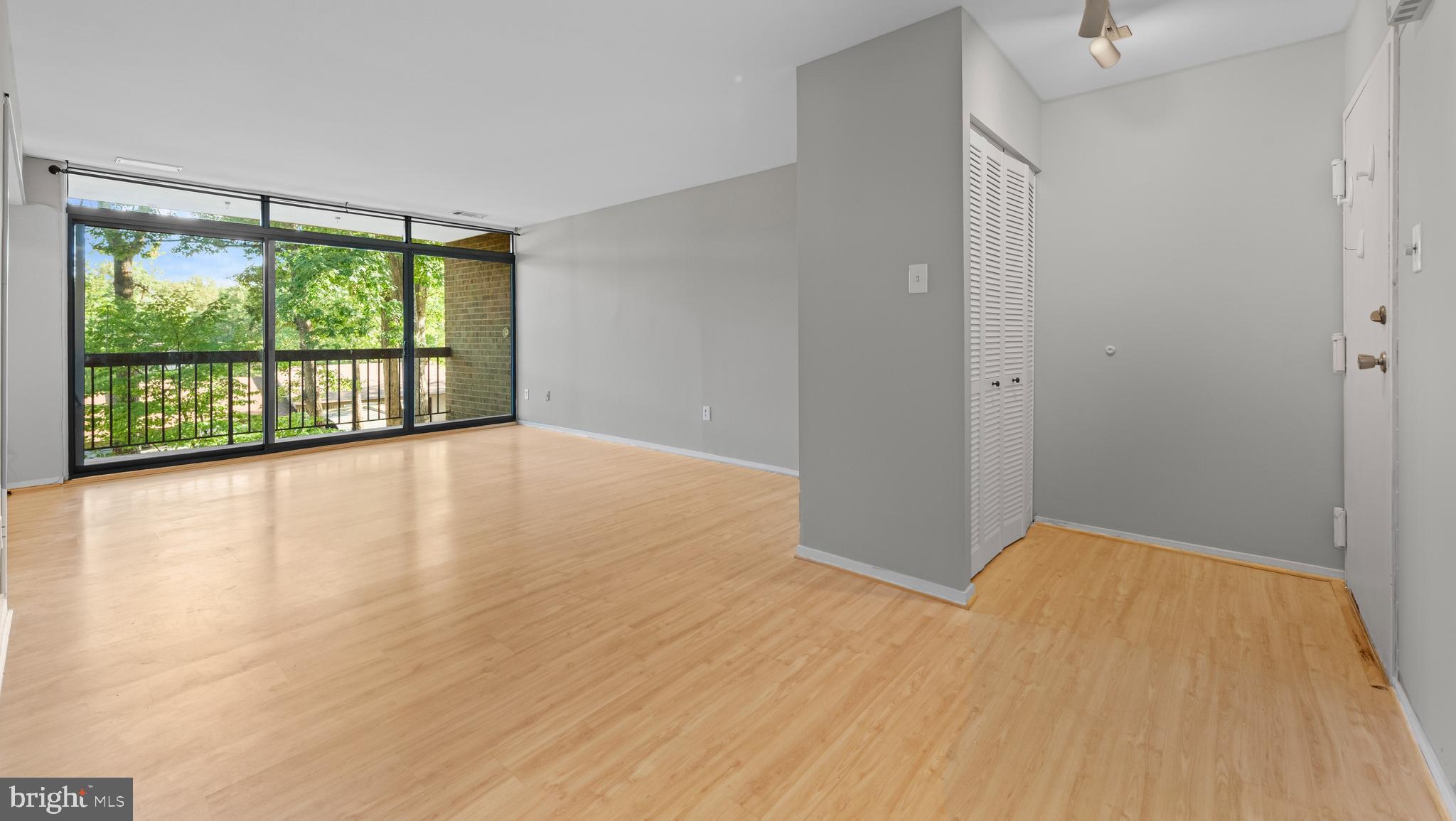 1645 Parkcrest Circle, Unit 200 Reston, VA 20190 - Photo 29 of 29 a view of an empty room with glass door
