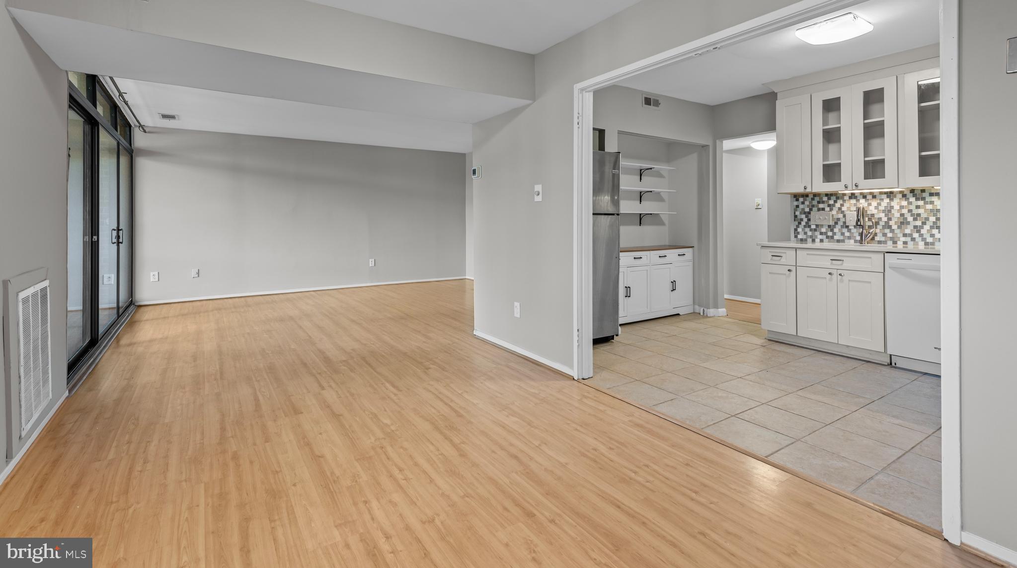 1645 Parkcrest Circle, Unit 200 Reston, VA 20190 - Photo 20 of 29 a view of kitchen with furniture and wooden floor