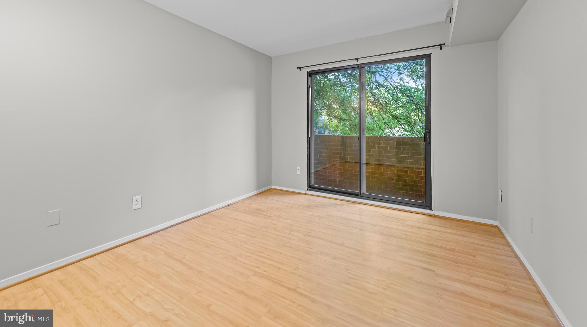 1645 Parkcrest Circle, Unit 200 Reston, VA 20190 - Photo 22 of 29 a view of empty room with wooden floor and fan