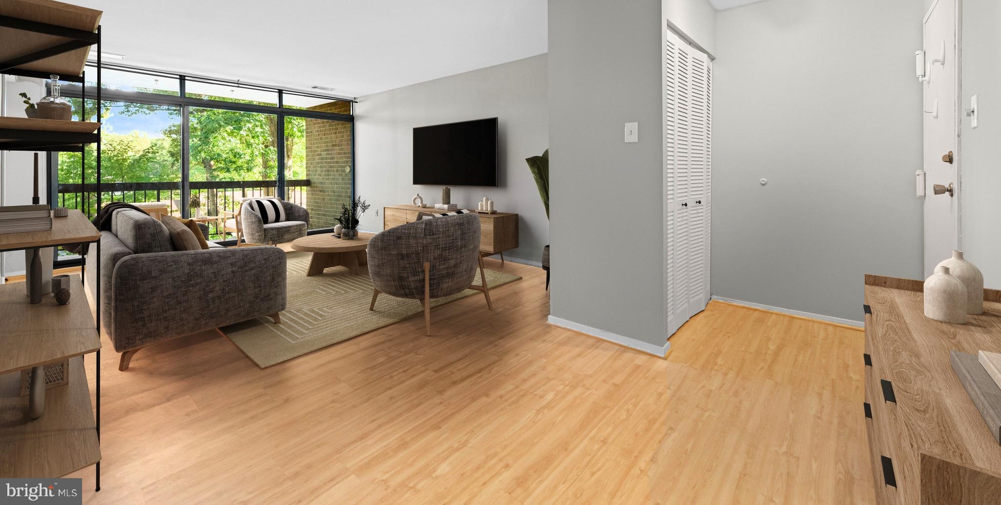 1645 Parkcrest Circle, Unit 200 Reston, VA 20190 - Photo 28 of 29 a bedroom with furniture and a flat screen tv