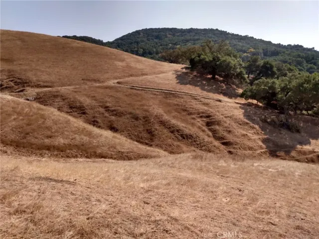 a view of mountain view with mountains in the background