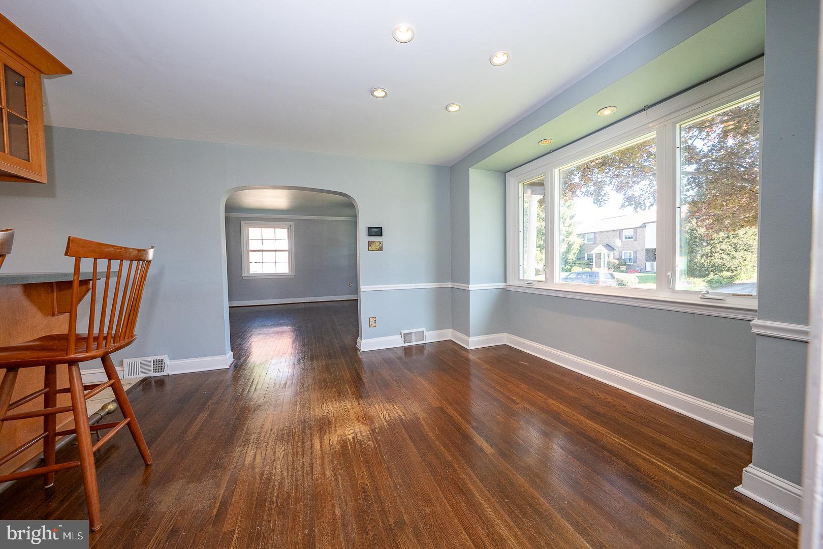 306 Sedgewood Road Springfield, PA 19064 - Photo 11 of 55 a view of empty room with wooden floor and fan