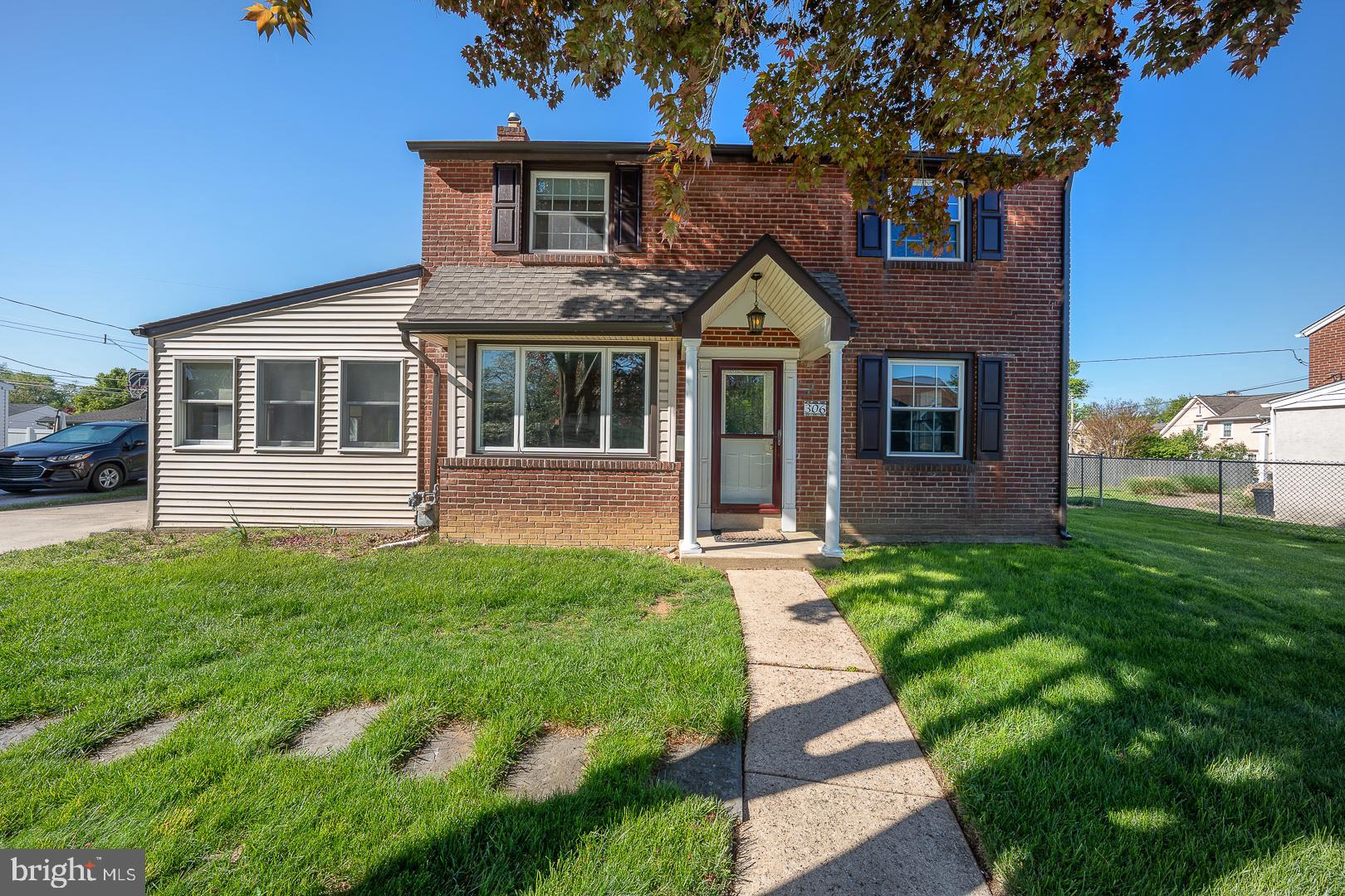 306 Sedgewood Road Springfield, PA 19064 - Photo 2 of 55 a front view of a house with a yard