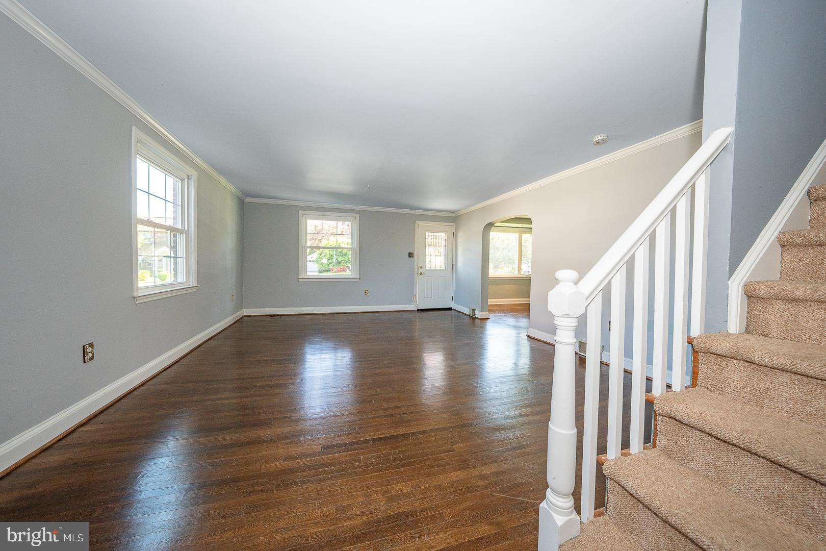 306 Sedgewood Road Springfield, PA 19064 - Photo 21 of 55 a view of empty room with wooden floor and fan