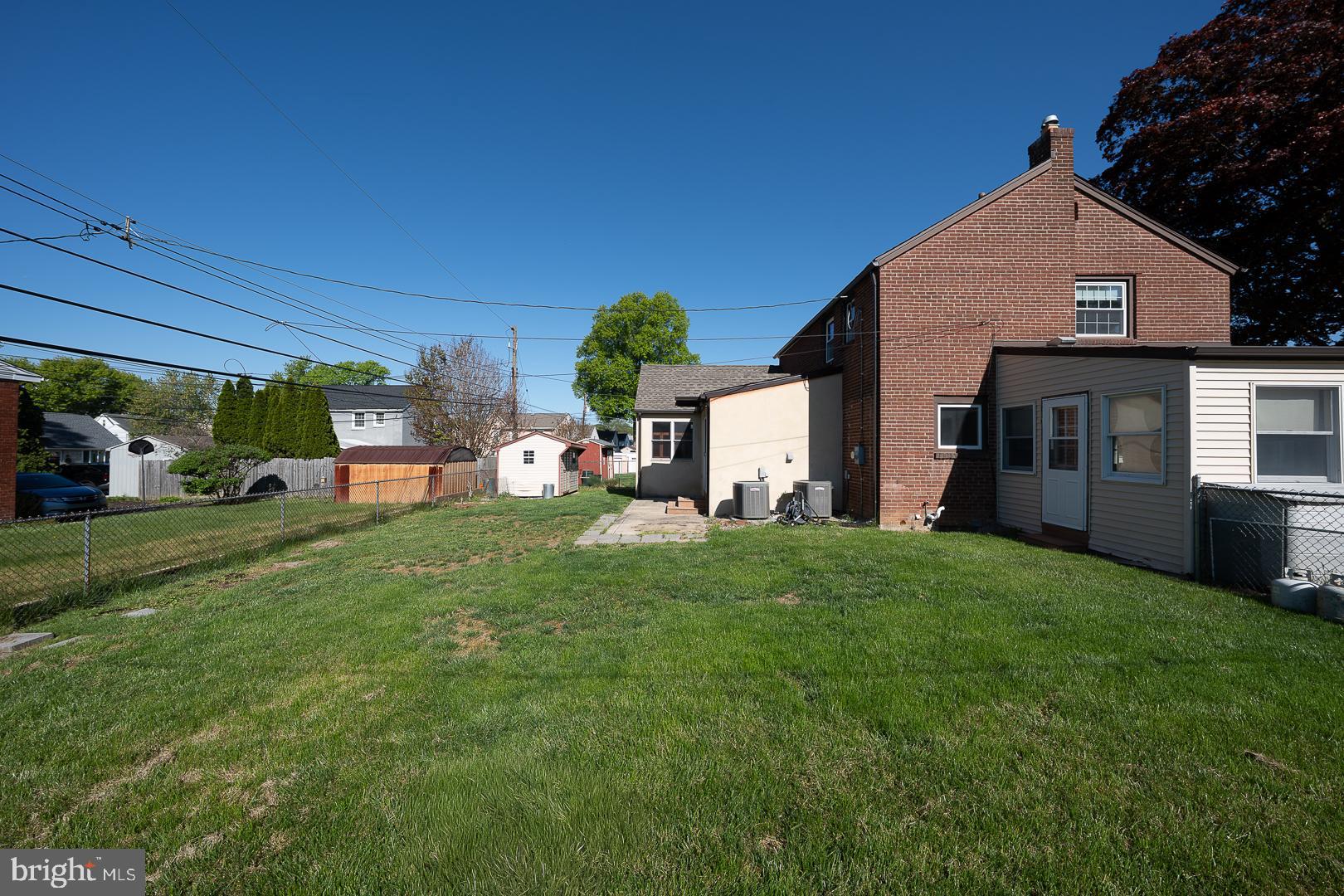 306 Sedgewood Road Springfield, PA 19064 - Photo 49 of 55 a view of a house with backyard porch and sitting area