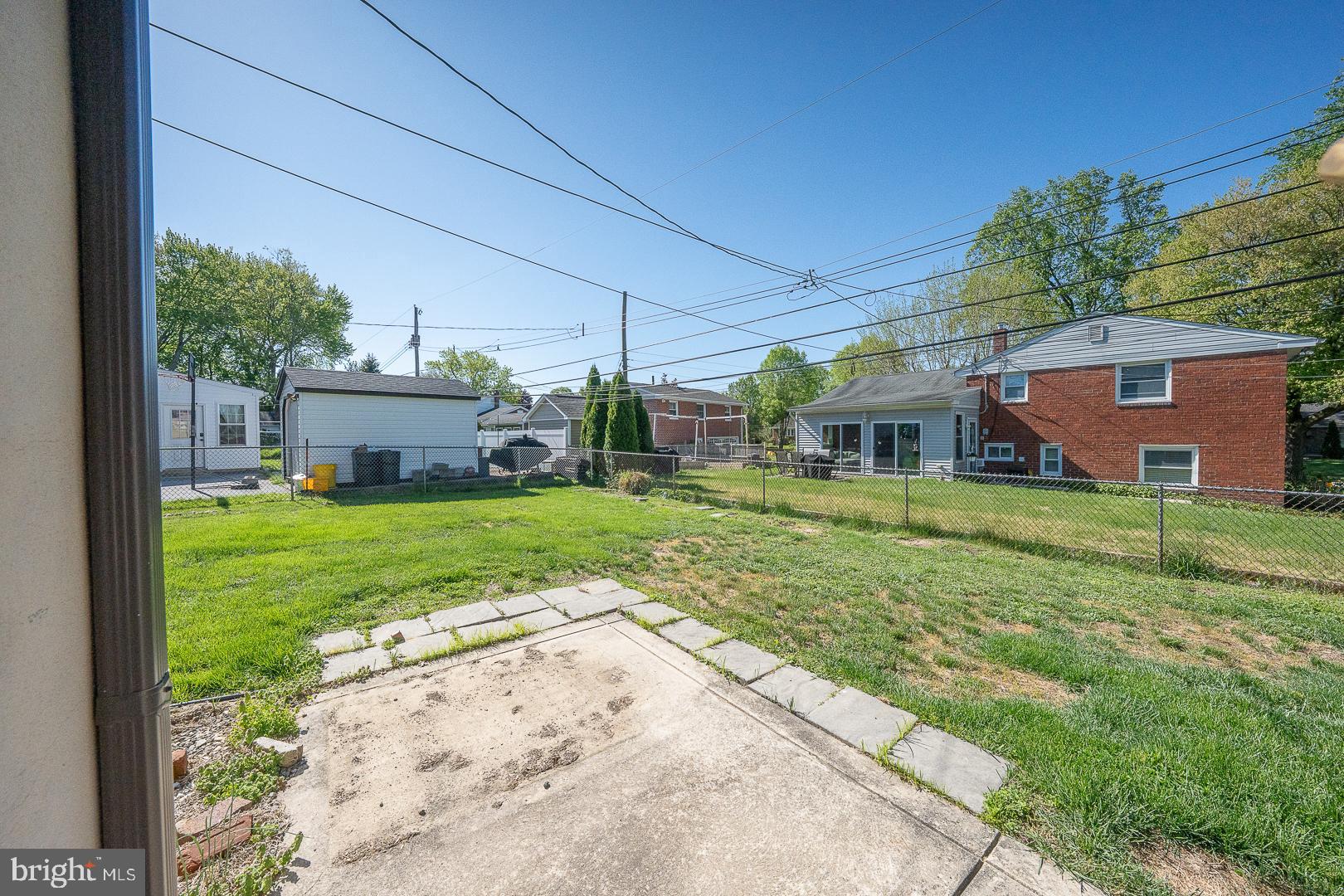 306 Sedgewood Road Springfield, PA 19064 - Photo 50 of 55 a view of a house with a yard porch and sitting area