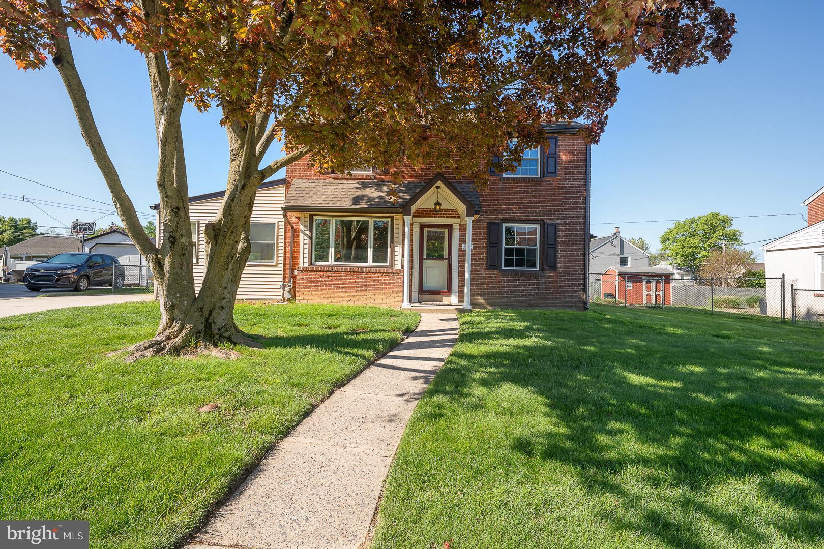 306 Sedgewood Road Springfield, PA 19064 - Photo 52 of 55 a front view of a house with garden