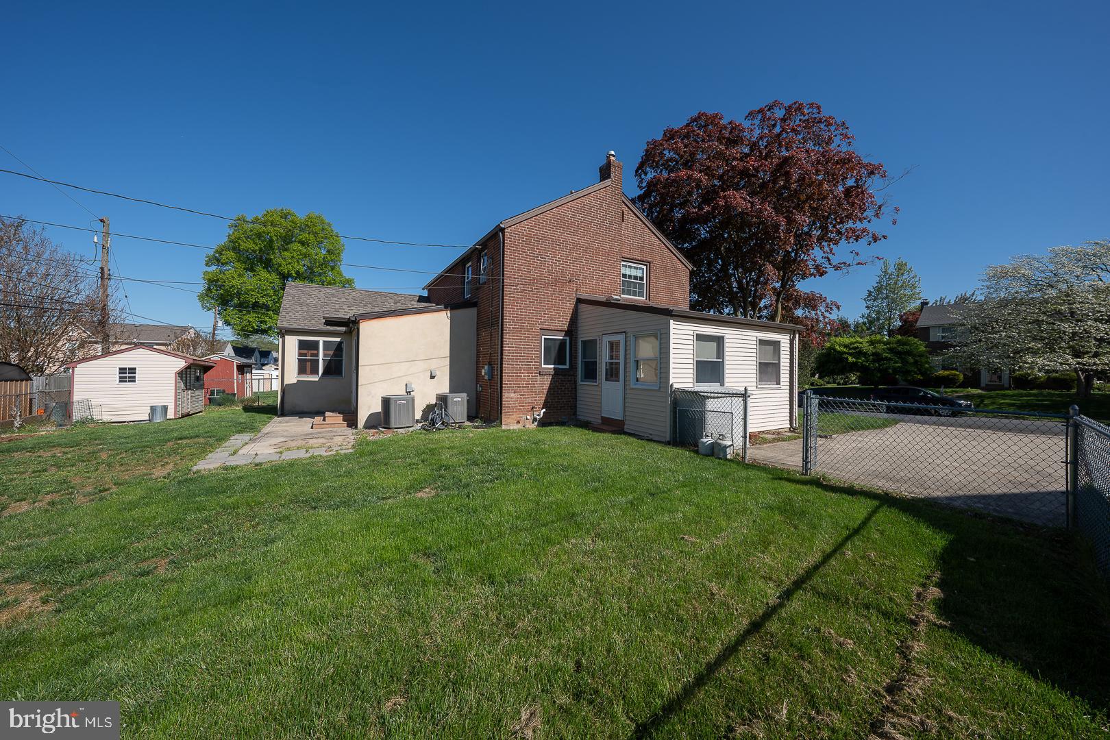 306 Sedgewood Road Springfield, PA 19064 - Photo 53 of 55 a front view of a house with garden