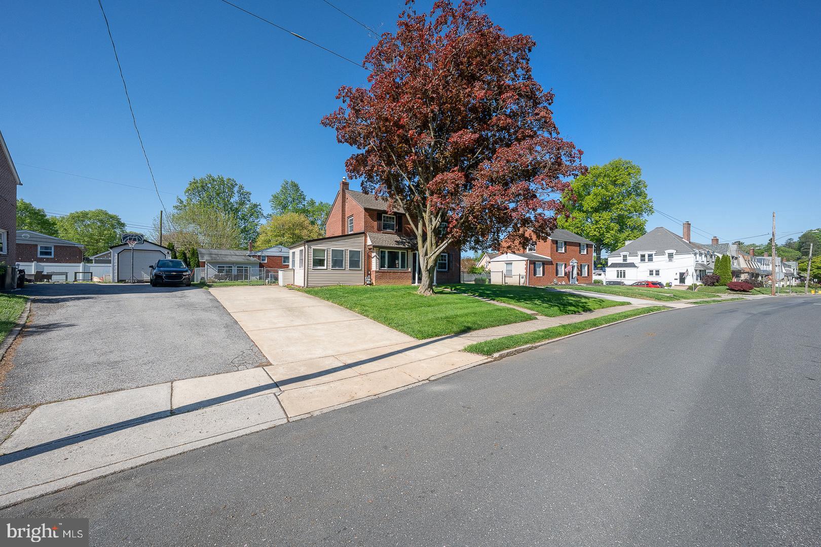 306 Sedgewood Road Springfield, PA 19064 - Photo 55 of 55 a house with trees in the background